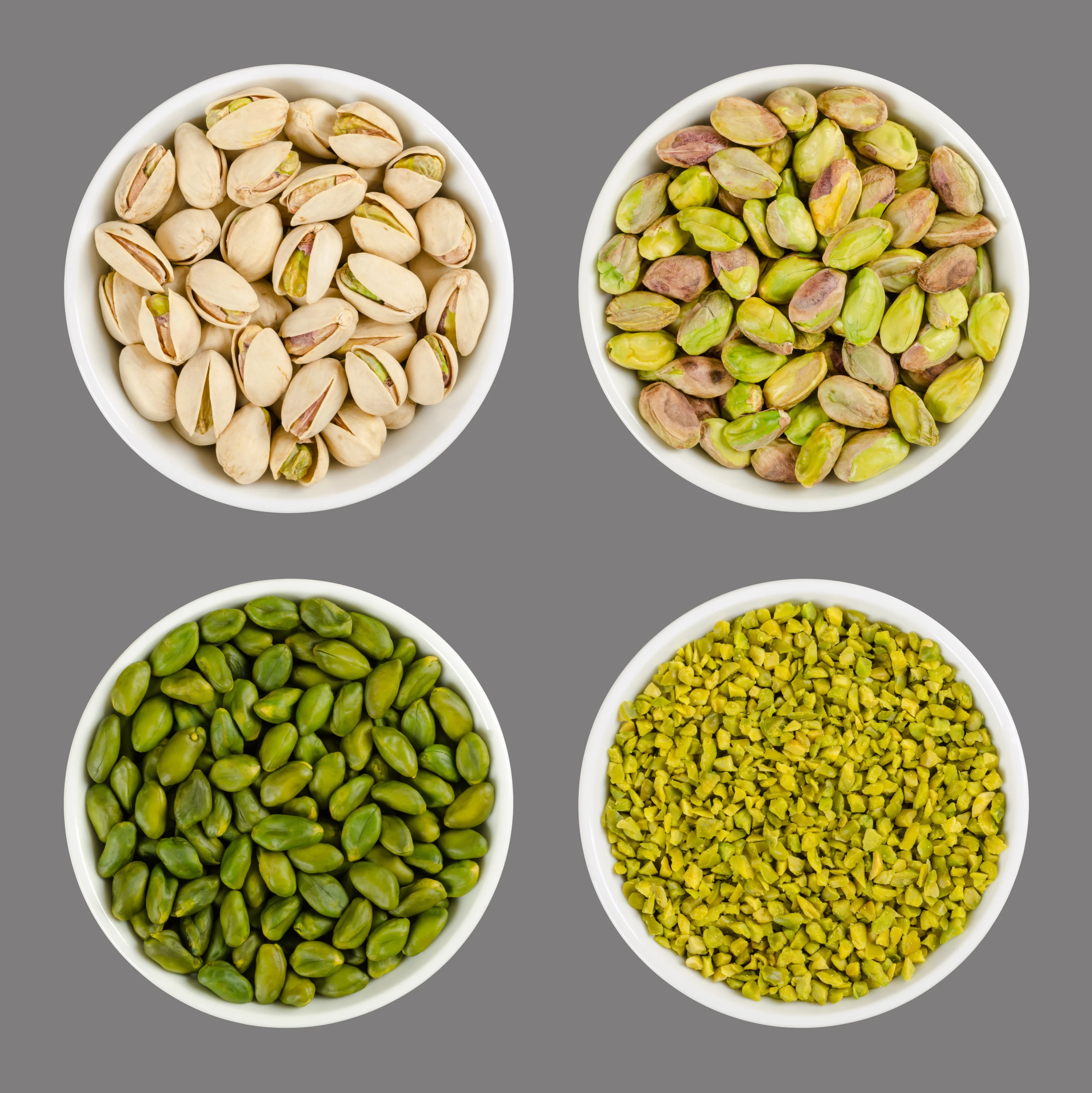 Close-up of whole green peeled pistachio kernels